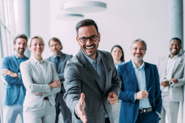 istock Confident businessman and his team. 2173063110