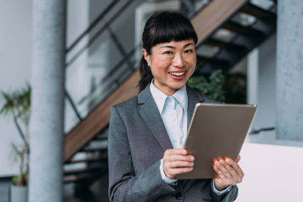 istock Confident businesswoman in modern office. 2173063169