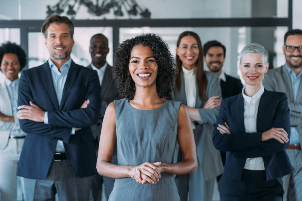 istock Confident businesswoman and her team. 2173063571
