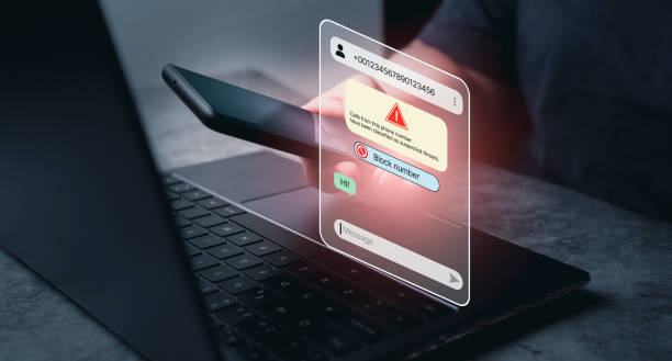 istock Woman use smartphone and receives message from suspected number scam. 2173064387