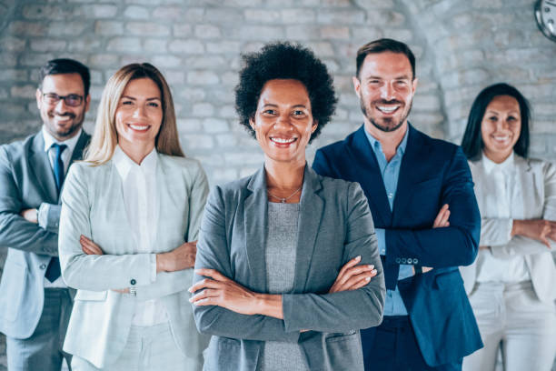 istock Confident businesswoman and her team. 2173064793