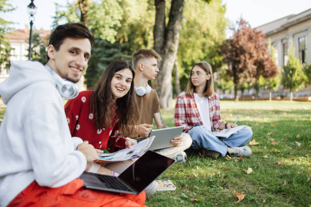 istock Cheerful Students Enjoying Time in the Park 2173065158
