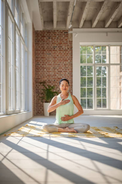 istock Yoga and meditation session in bright serene space 2173066484