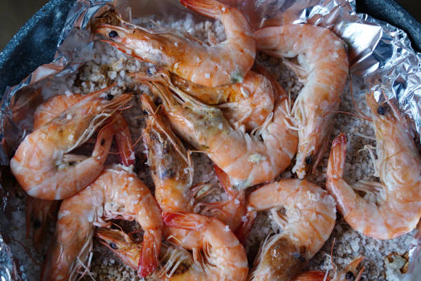 istock Grilled shrimps baked red on a pan and foil 2173066892