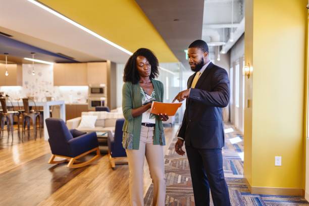 istock Businessman talking with his assistant in the modern office space 2173071093