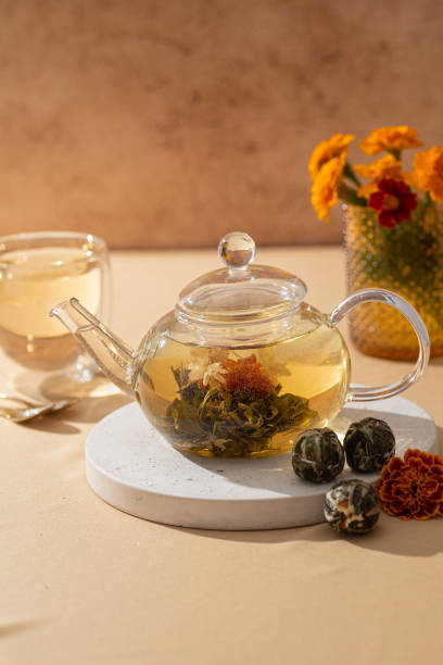 istock Exotic Handcrafted Flower Tea Balls with exquisite Infusion . Asian green tea ceremony. Vertical 2173078794