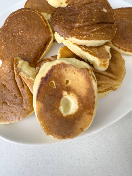istock pancakes with surprised face shape on plate for breakfast. 2173086805