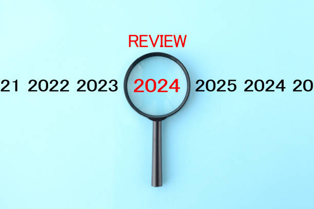 istock Image photo looking back at 2024 through magnifying glass 2173086981