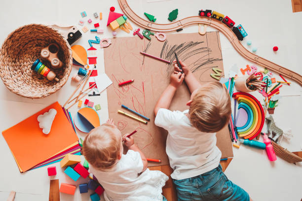 istock Kids draw and make crafts. Kindergarten or preschool background. 2173094560