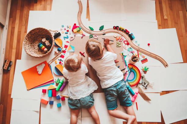 istock Kids draw and make crafts. Kindergarten or preschool background. 2173094585