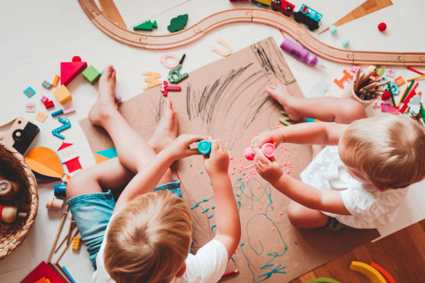 istock Kids draw and make crafts. Kindergarten or preschool background. 2173094591