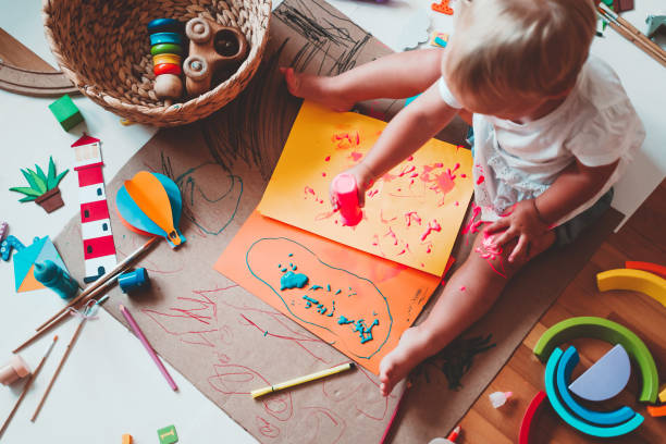 istock Kids draw and make crafts. Kindergarten or preschool background. 2173094745
