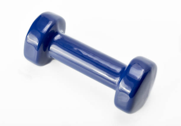 istock Small blue dumbbells, isolated in white background. Sports projectile for exercise. 2173097738