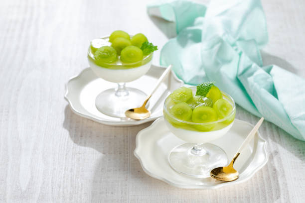 Homemade yogurt mousse topped with grapes jelly