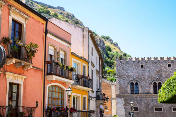 Beautiful balcony with flowers- Sicilian building facades in Taormina old town