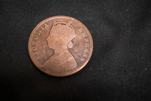 istock 18th century british india colonial coin on black background 2173109553