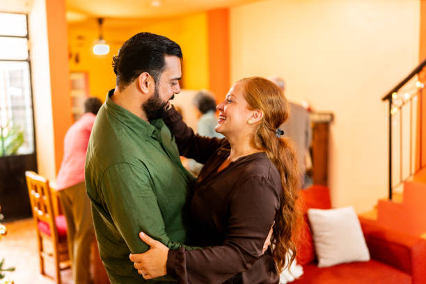 Couple dancing at home