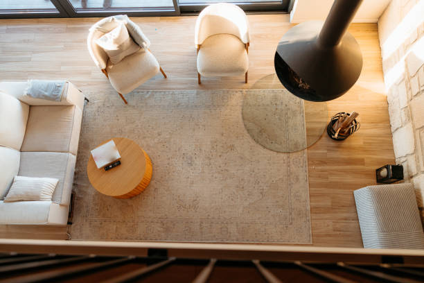 istock Modern cabin interior design with fireplace enjoying stunning sunset view 2173110579
