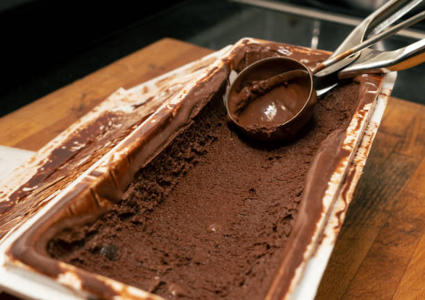 istock Bowl with belgian chocolate ice cream and spheric spoon for serving 2173115461