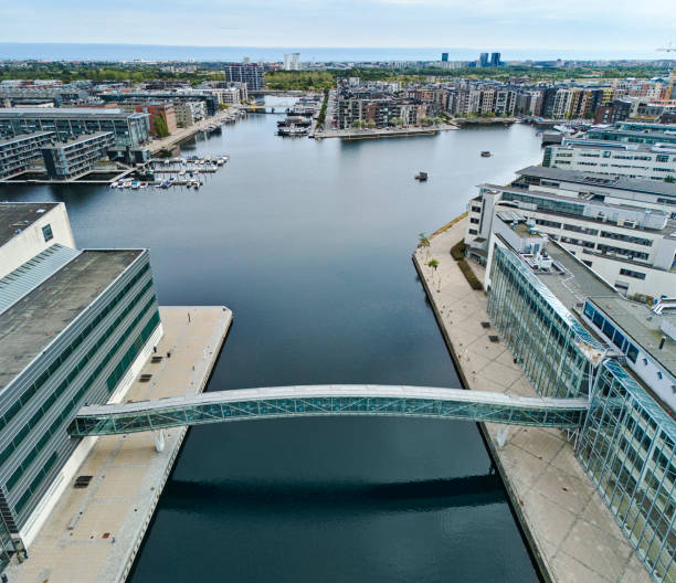 istock Bridge across canal connecting waterfront offices 2173115601