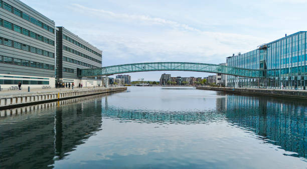 istock Bridge across canal connecting waterfront offices 2173115787