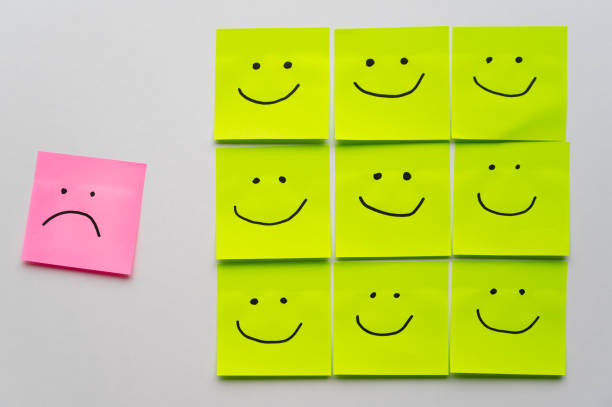 istock Sheets of paper with smiley faces drawn on them. 2173125995