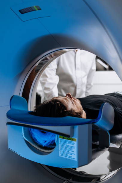 istock In a bright diagnostic center, a young man undergoes a CT or MRI scan using modern equipment. This image reflects the forefront of medical technology, emphasizing precision and patient care. 2173126746