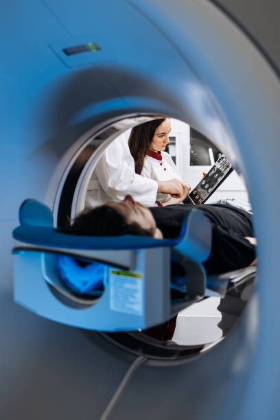 istock The patient lies inside an MRI or CT machine where the scan is performed. This high-tech equipment represents an innovation in diagnostics, providing accurate information for effective treatment. 2173126793
