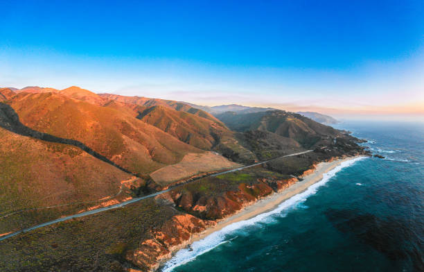 Sunset at pacific ocean at Big Sur, California from a drone