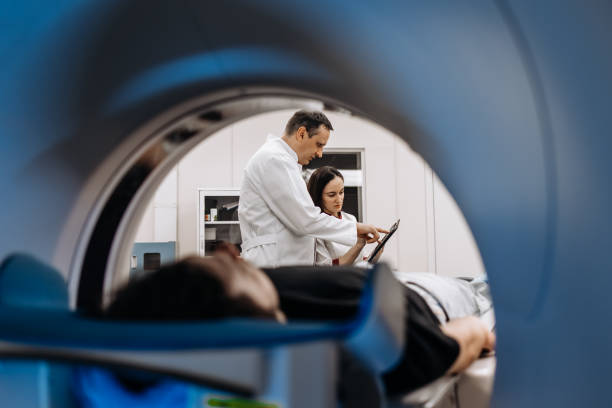 istock In a bright diagnostic center, a young man undergoes a CT or MRI scan using modern equipment. This image reflects the forefront of medical technology, emphasizing precision and patient care. 2173126822