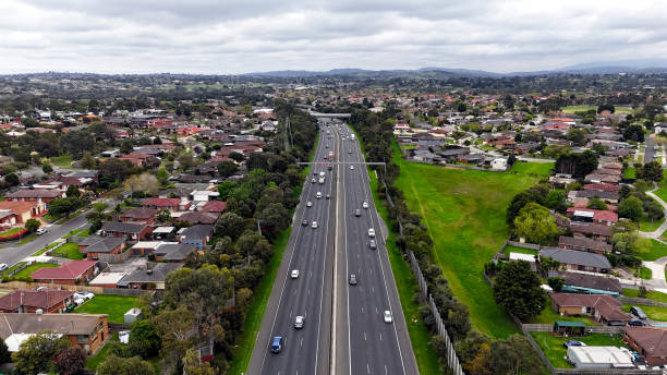 istock Aerial view of suburb with freeway 2173127994