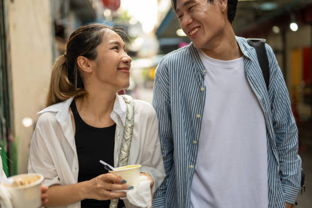 istock A Young Couple Enjoying Ice Cream Together 2173131373