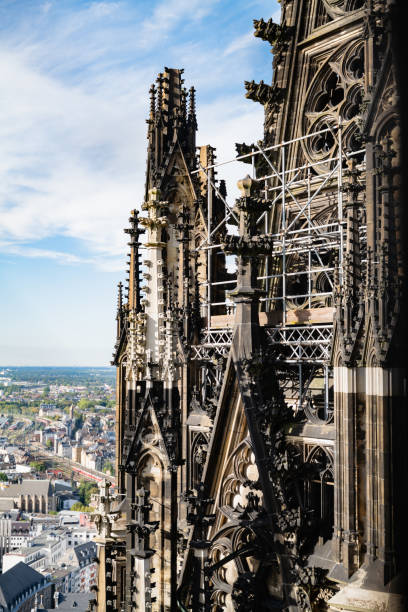 Gothic spire with scaffolding in Cologne Cathedral, highlighting restoration work on the historic church to preserve its architectural and cultural heritage.