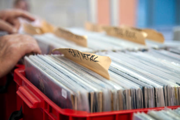istock Choosing vinyl record in music record shop 2173147602