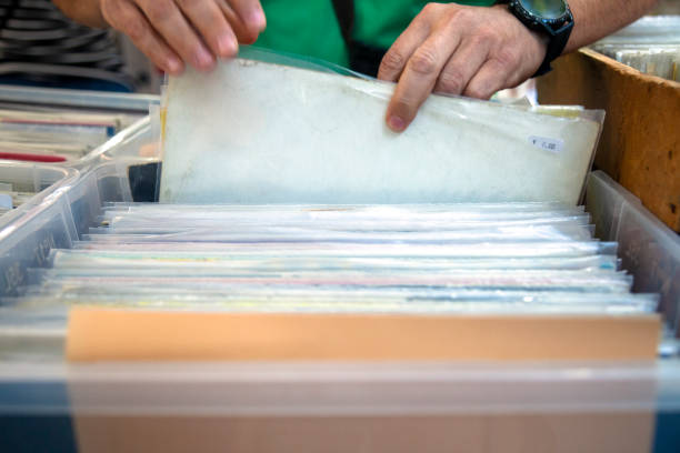 istock Choosing vinyl record in music record shop 2173147613