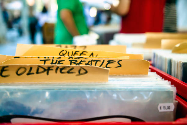 Choosing vinyl record in music record shop