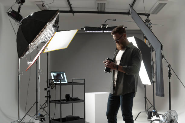 istock Professional photographer in a studio with specialized equipment for highquality sessions 2173147762