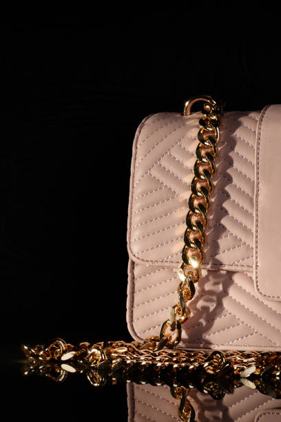 istock Luxury Pink Quilted Purse with Gold Chain Strap 2173148679
