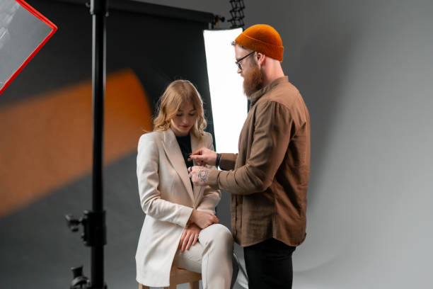 istock A woman at film studio set. Behind the scenes concept 2173149683