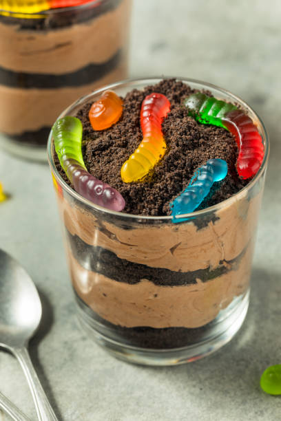 istock Sweet Sugary Dirt Chocolate Pudding with Gummy Worms 2173149785
