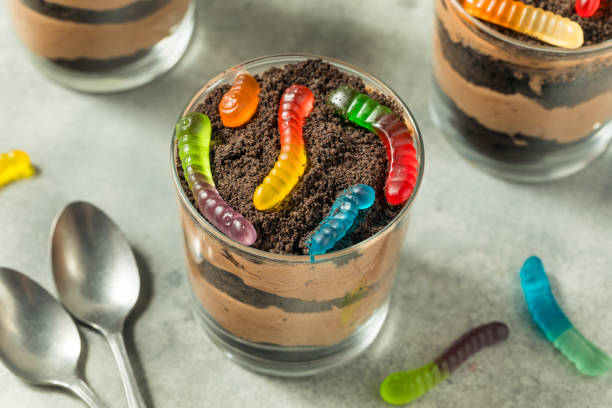 istock Sweet Sugary Dirt Chocolate Pudding with Gummy Worms 2173150732