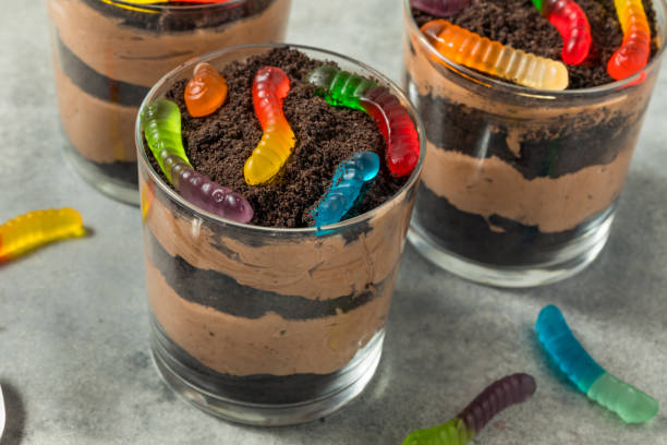istock Sweet Sugary Dirt Chocolate Pudding with Gummy Worms 2173150876