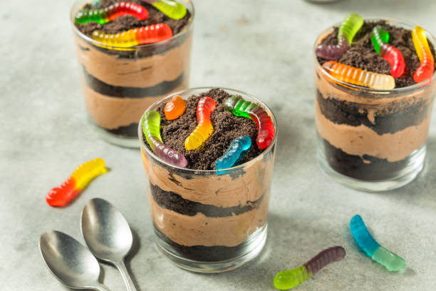 istock Sweet Sugary Dirt Chocolate Pudding with Gummy Worms 2173151116
