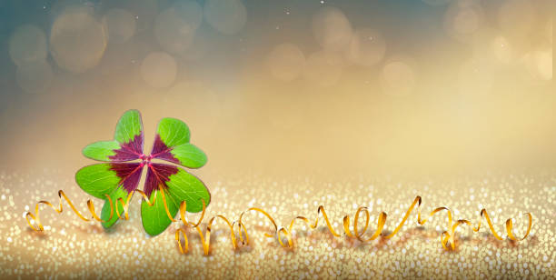 New Year's Eve motif with cloverleaf and bokeh effect