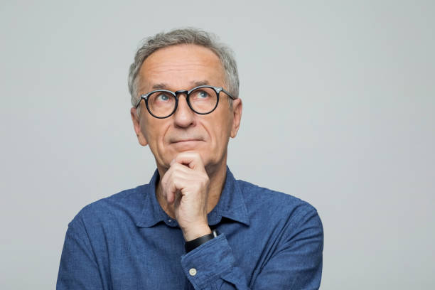 istock Headshot of thoughtful senior man 2173155013