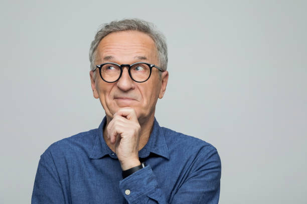 istock Headshot of thoughtful senior man 2173155077