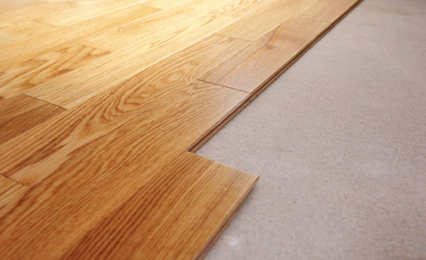istock Laying oak parquet on a concrete screed. 2173155200