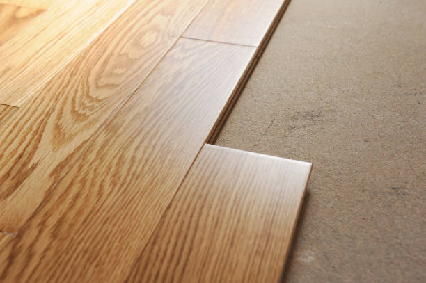 istock Laying oak parquet on a concrete screed. 2173155204