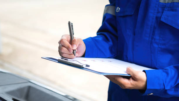 istock Maintenance the car and checking on service checklist. 2173156162