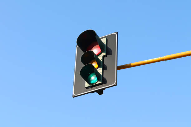istock Traffic light isolated in the clear sky. 2173159250
